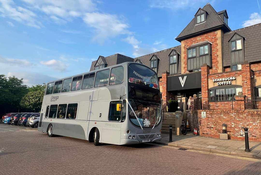 Wedding Bus parked outside a local hotel.