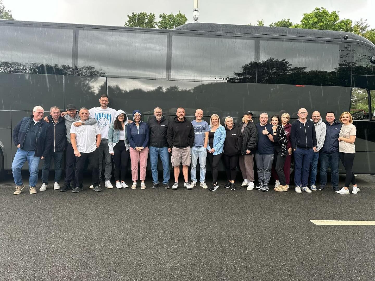 Picture of Halton Haven Hospice team with their transport from Omega Busways